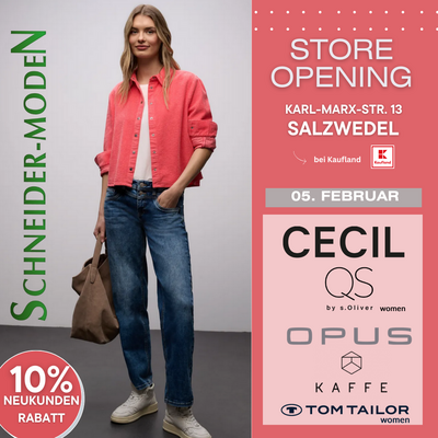 Frau in roter Bluse und blauen Jeans in einer Modewerbung.